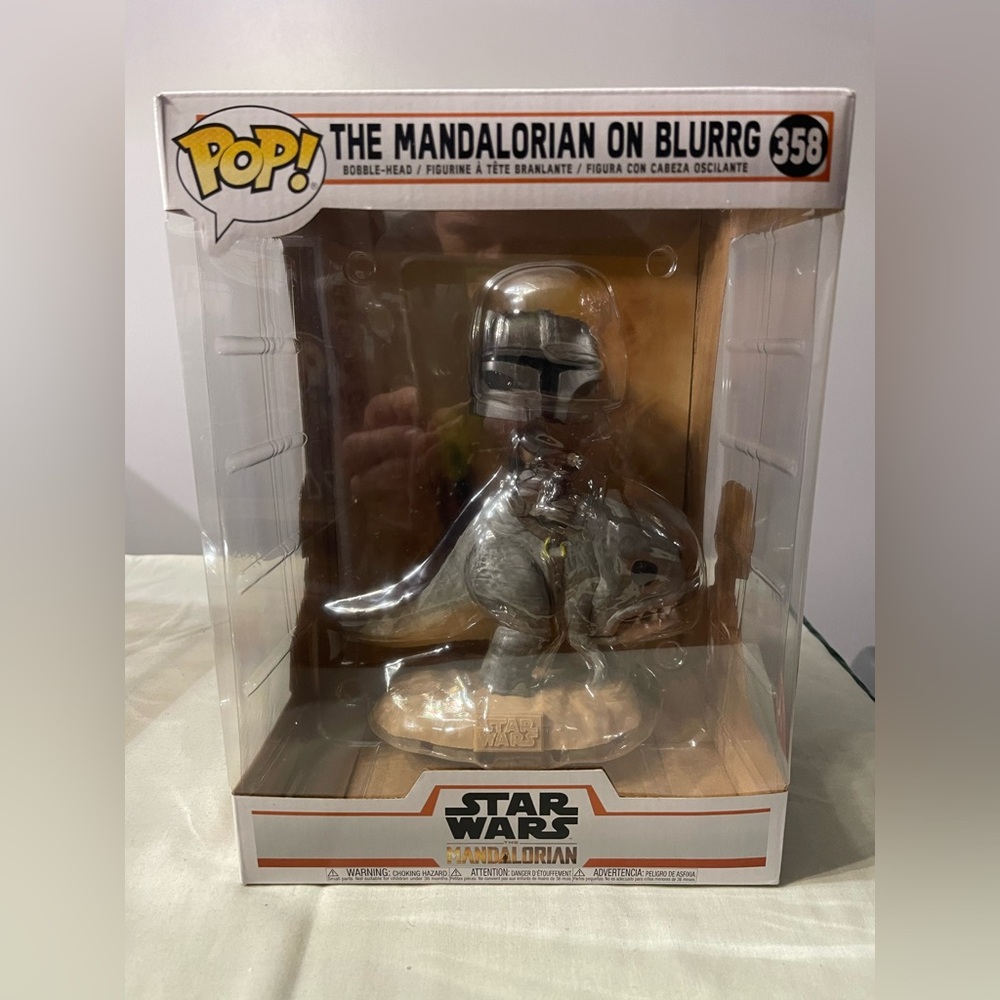 Star Wars 
Funko Pops 
Mandolorian on Blurrg #385